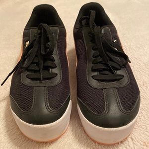 Black and pink size 10 pumas (new)
